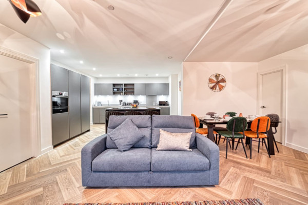 Modern Airbnb living room with stylish open plan design.